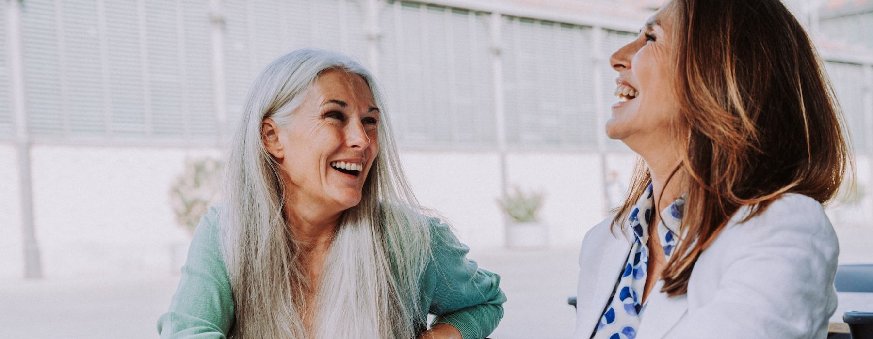 a couple of women laughing