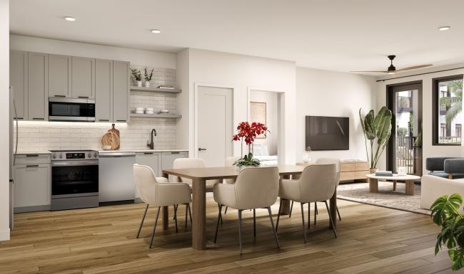 a kitchen with a dining table and chairs