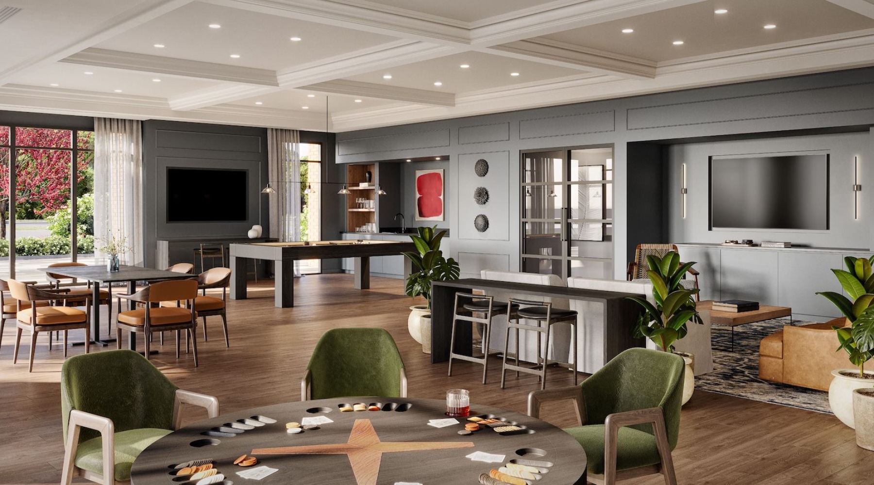 a clubroom with a tv, tables and chairs