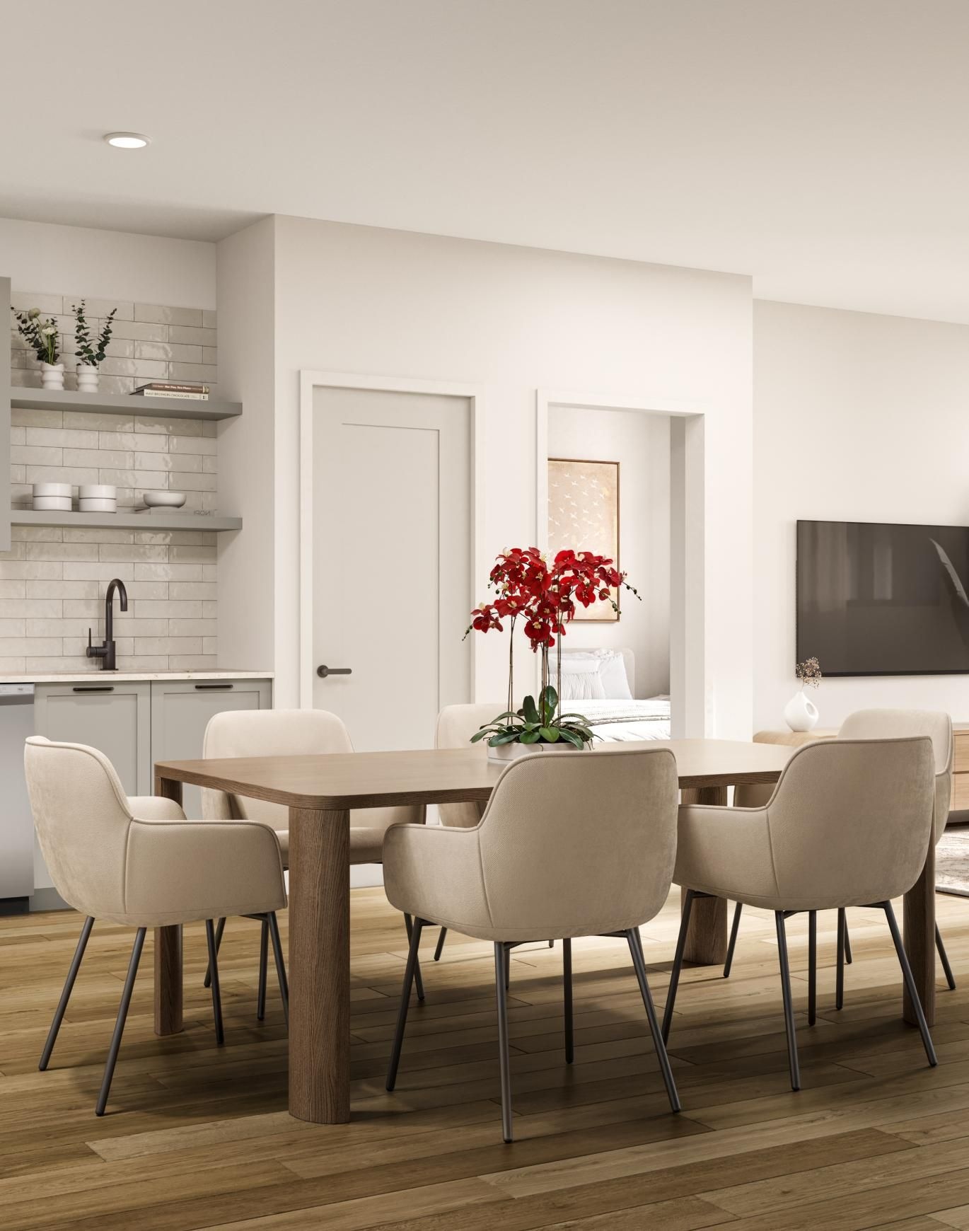 a kitchen with a table and chairs